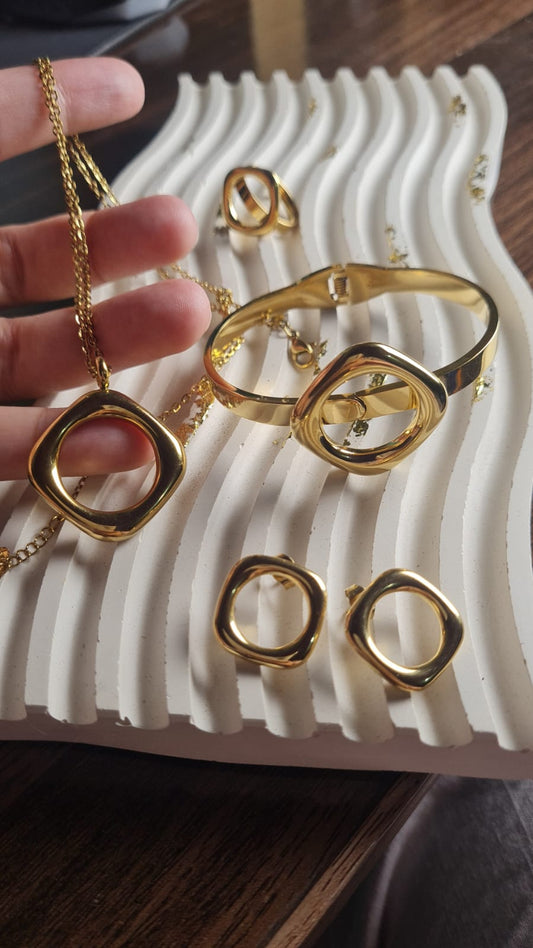 Stainless Steel- Gold plated 4 piece Necklace set