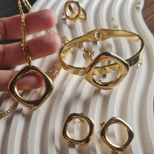 Stainless Steel- Gold plated 4 piece Necklace set